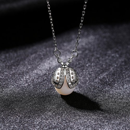 Collana in argento con perla e zirconi "Coccinella"